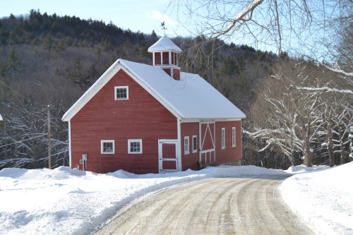 red barn in snow