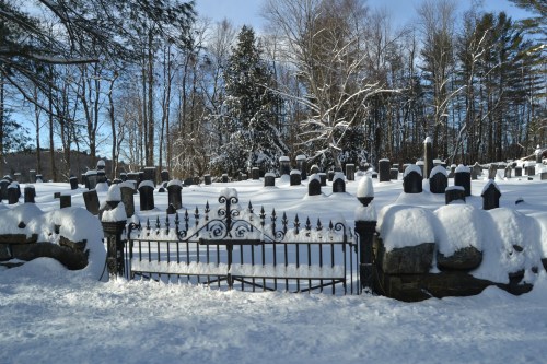 snowy cemetery gate