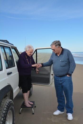 By the time Motor Man got the step stool from the back of the Jeep, she had already taken her shoes and knee-hi's.