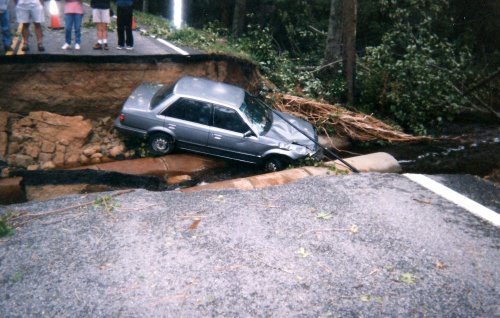 car-in-washed-out-road-10-6-2016-3-10-29-pm